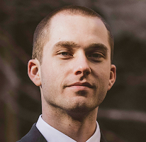 Portrait of Thomas Whitfield, crypto market expert and trading analyst